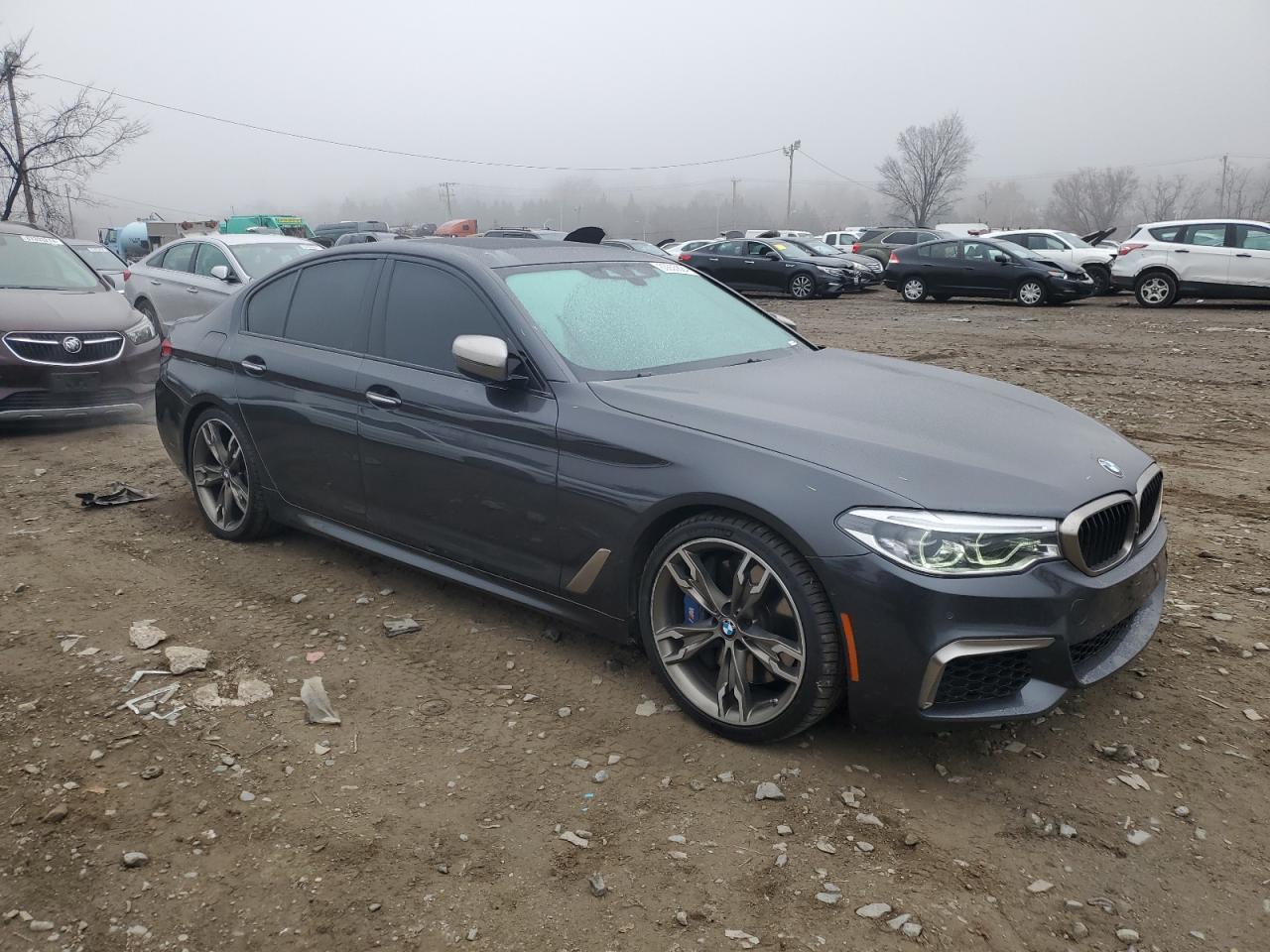 2018 BMW M5 VIN WBAJB9C52JB286351 Copart auction photo, water/flood / minor dent/scratches damage thumbnail 4