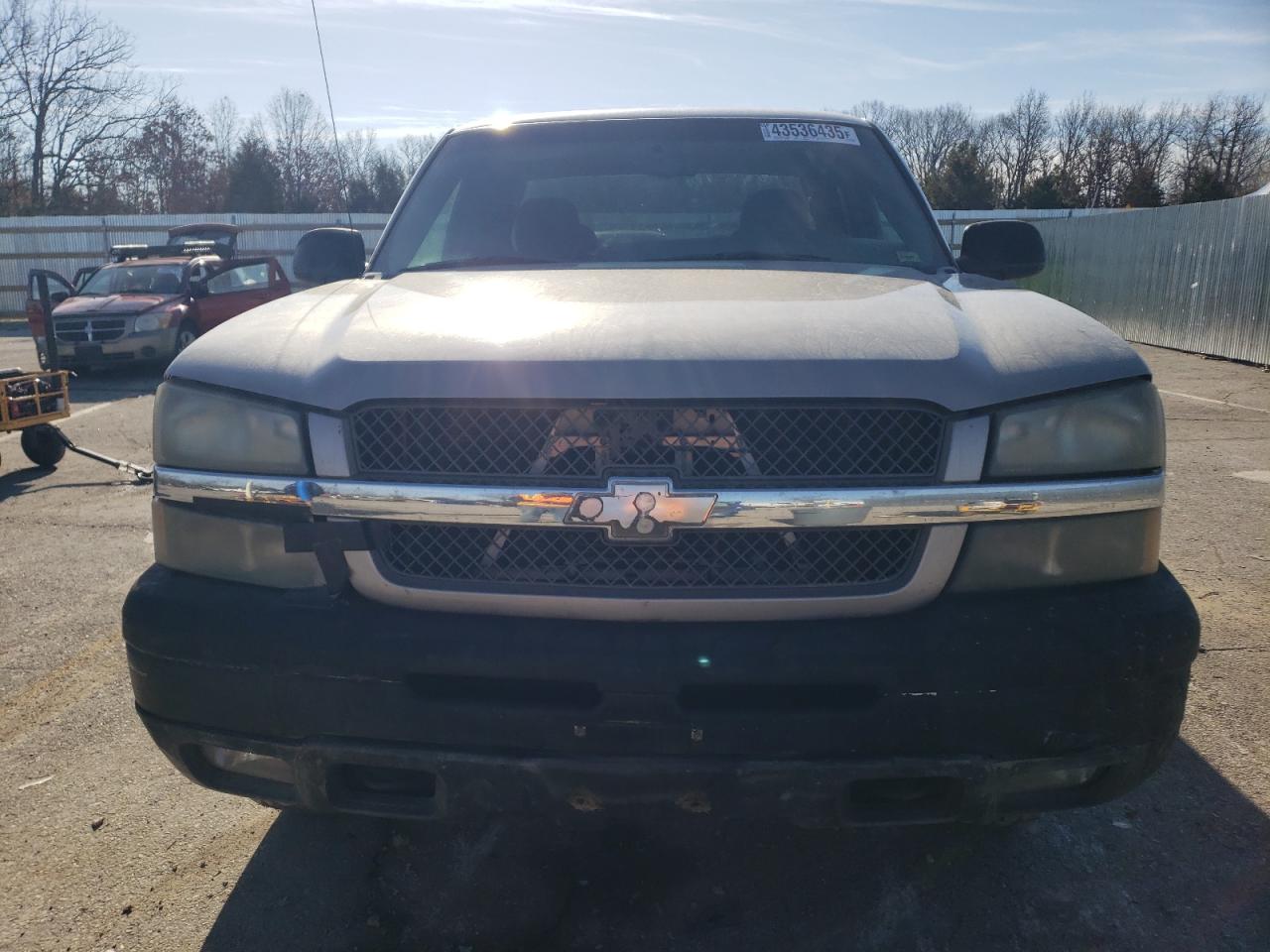 2005 Chevrolet Silverado VIN 2GCEK19TX51227453 Copart auction photo, front end / rear end damage thumbnail 5