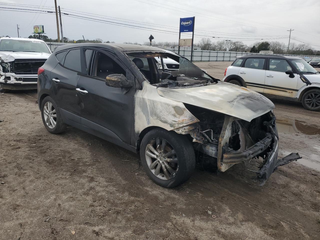 2011 Hyundai Tucson VIN KM8JUCAC9BU207948 Copart auction photo, burn damage thumbnail 4