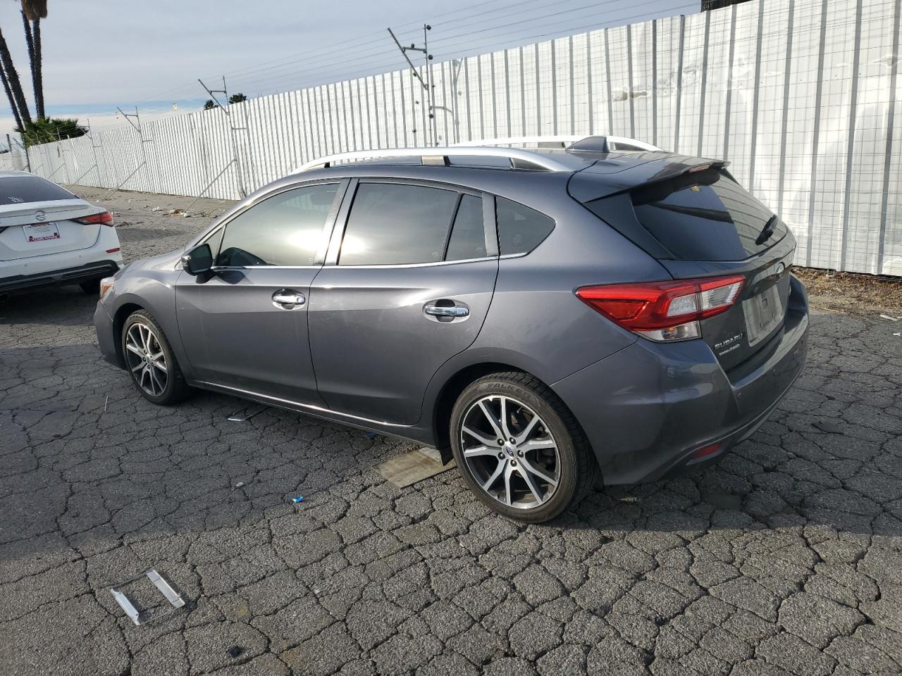 2018 Subaru Impreza VIN 4S3GTAT63J3705533 Copart auction photo, side / minor dent/scratches damage thumbnail 2
