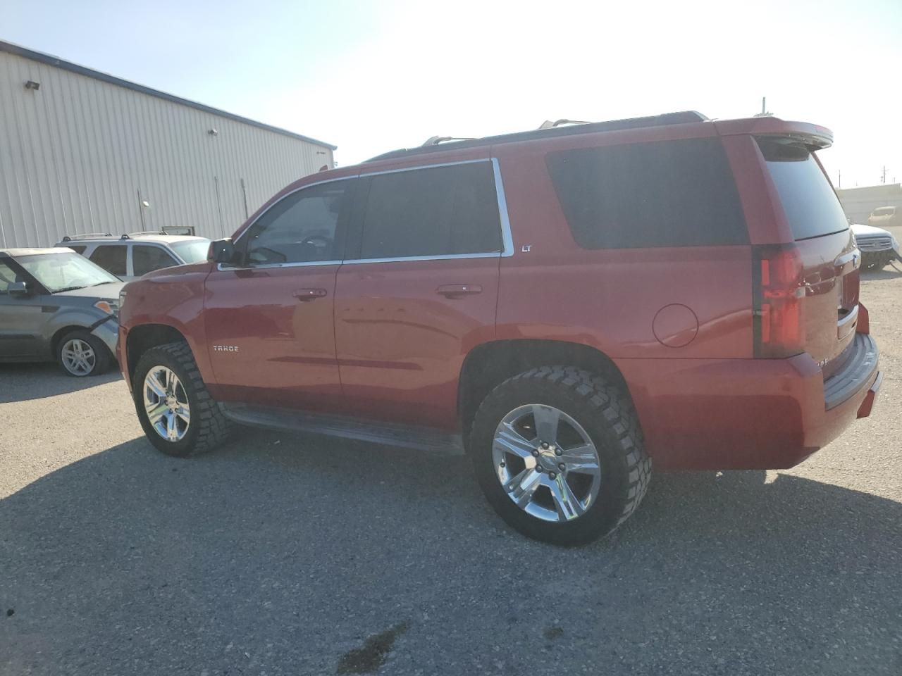 2015 Chevrolet Tahoe VIN 1GNSKBKC1FR671503 Copart auction photo, minor dent/scratches damage thumbnail 2