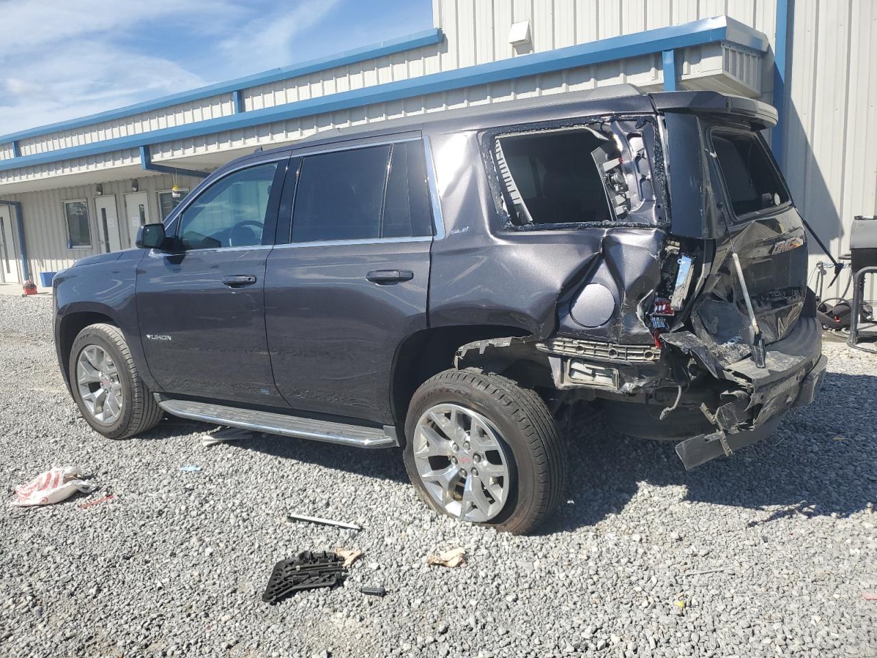 2016 GMC Yukon VIN 1GKS2AKC1GR402880 Copart auction photo, rear end / side damage thumbnail 2
