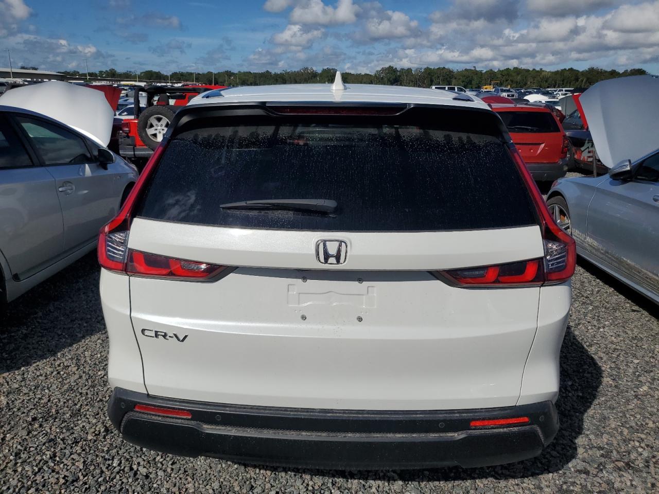 2023 Honda CR-V VIN 7FARS3H72PE011781 Copart auction photo, water/flood damage thumbnail 6