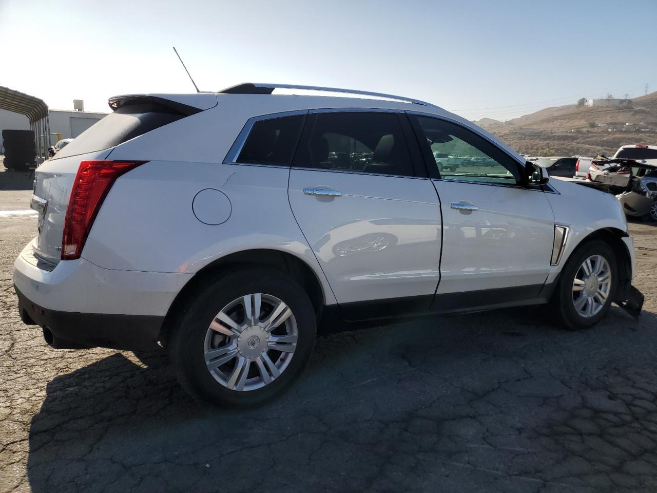 2016 Cadillac SRX VIN 3GYFNBE3XGS561264 Copart auction photo, front end damage thumbnail 3