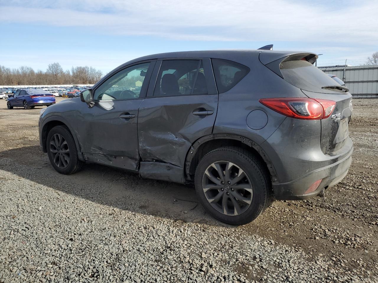 2016 Mazda CX-5 VIN JM3KE4DY5G0888974 Copart auction photo, side / rear end damage thumbnail 2