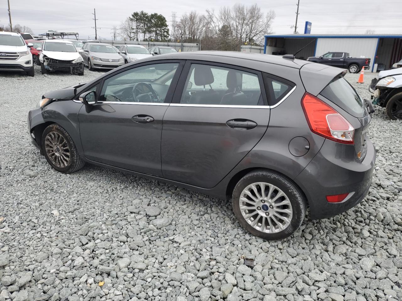 2016 Ford Fiesta VIN 3FADP4FJ2GM142321 Copart auction photo, front end / minor dent/scratches damage thumbnail 2