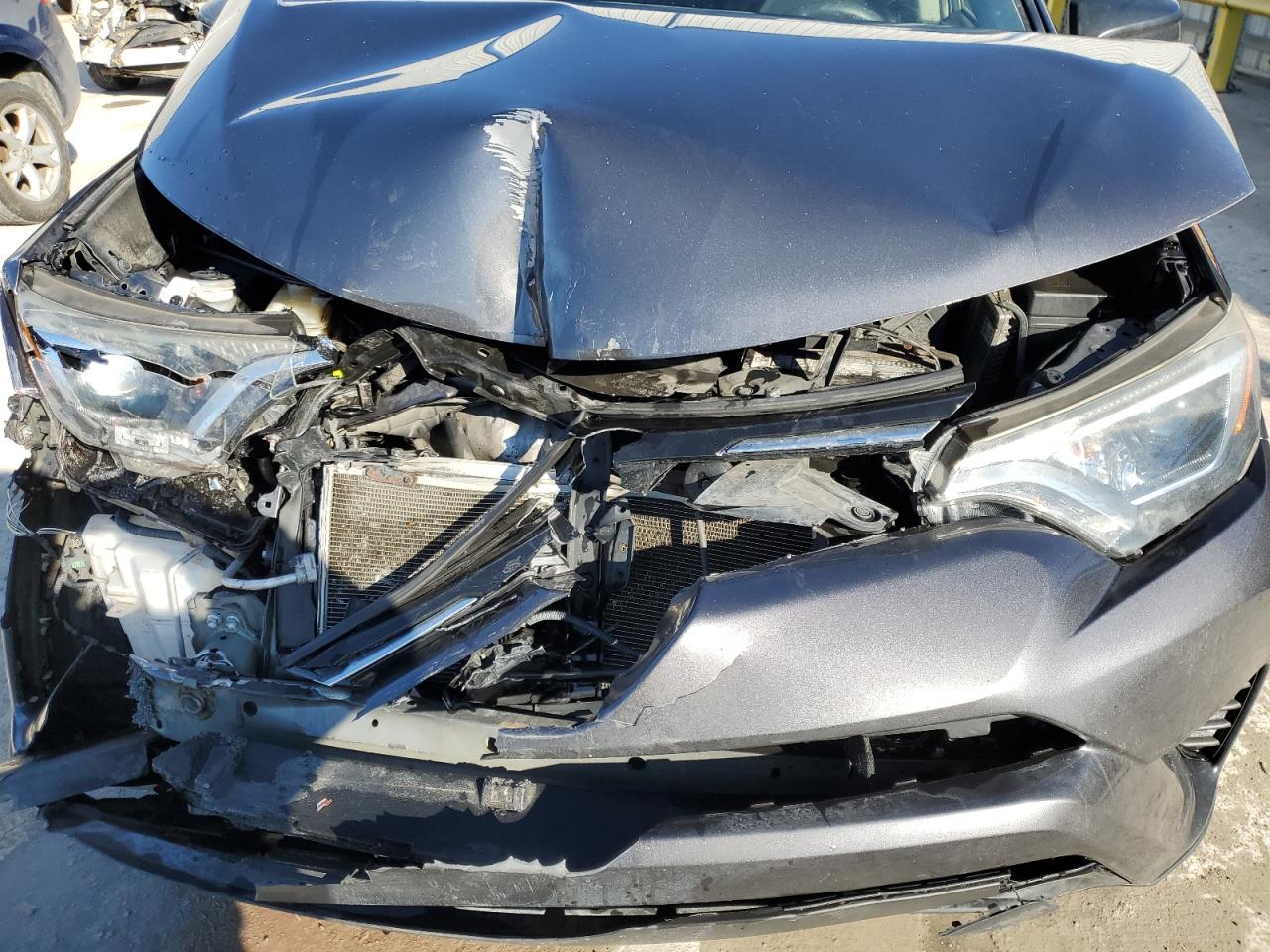 2017 Toyota RAV 4 VIN JTMBFREV9HJ709998 Copart auction photo, front end damage thumbnail 12