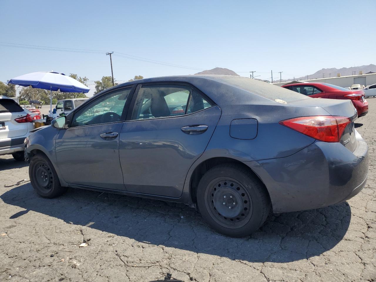 2019 Toyota Corolla VIN 5YFBURHE3KP894120 Copart auction photo, front end / side damage thumbnail 2