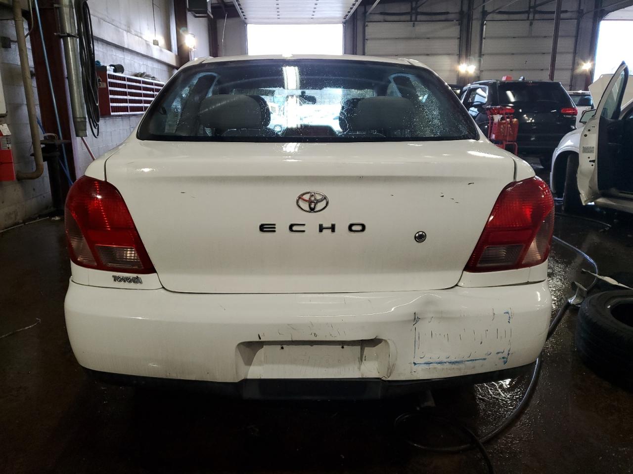 2001 Toyota Echo VIN JTDAT123810114175 Copart auction photo, rear end damage thumbnail 6
