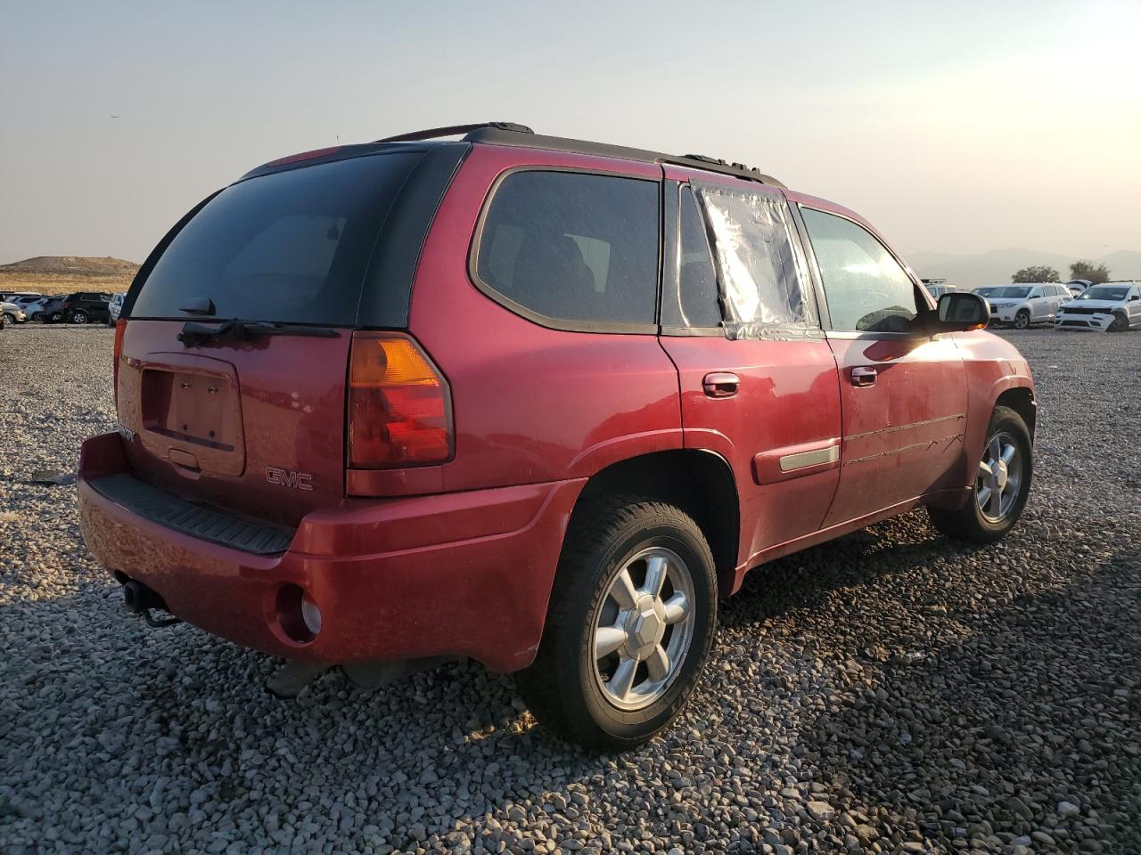 2002 GMC Envoy VIN 1GKDT13S022215529 Copart auction photo, side damage thumbnail 3