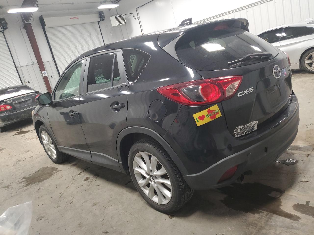 2013 Mazda CX-5 VIN JM3KE2DE2D0166030 Copart auction photo, mechanical / normal wear damage thumbnail 2