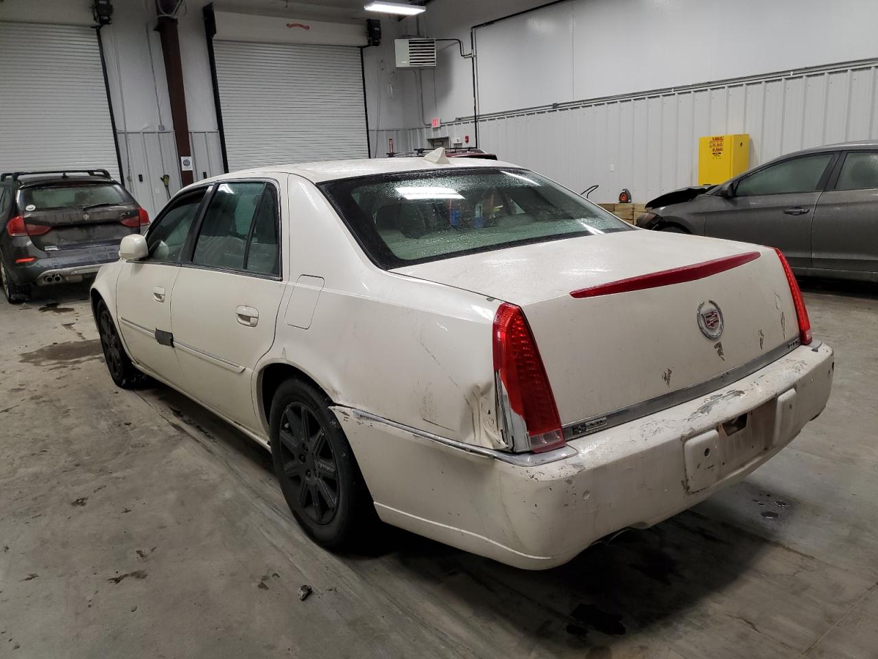 2010 Cadillac DTS VIN 1G6KH5EY3AU126623 Copart auction photo, rear end / all over damage thumbnail 2