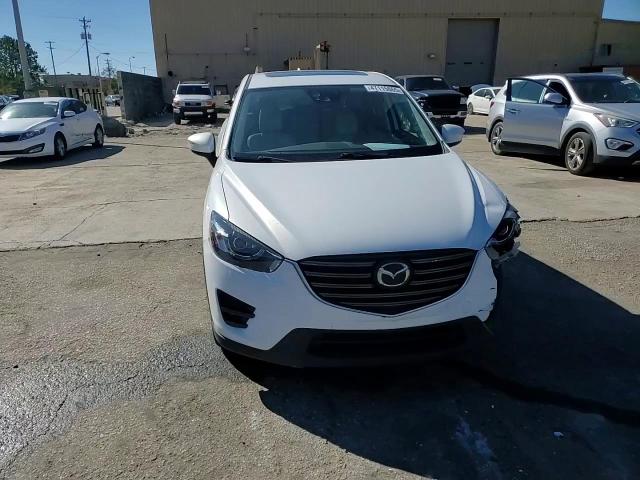 2016 Mazda CX-5 VIN JM3KE2DYXG0735303 Copart auction photo, front end / side damage thumbnail 10