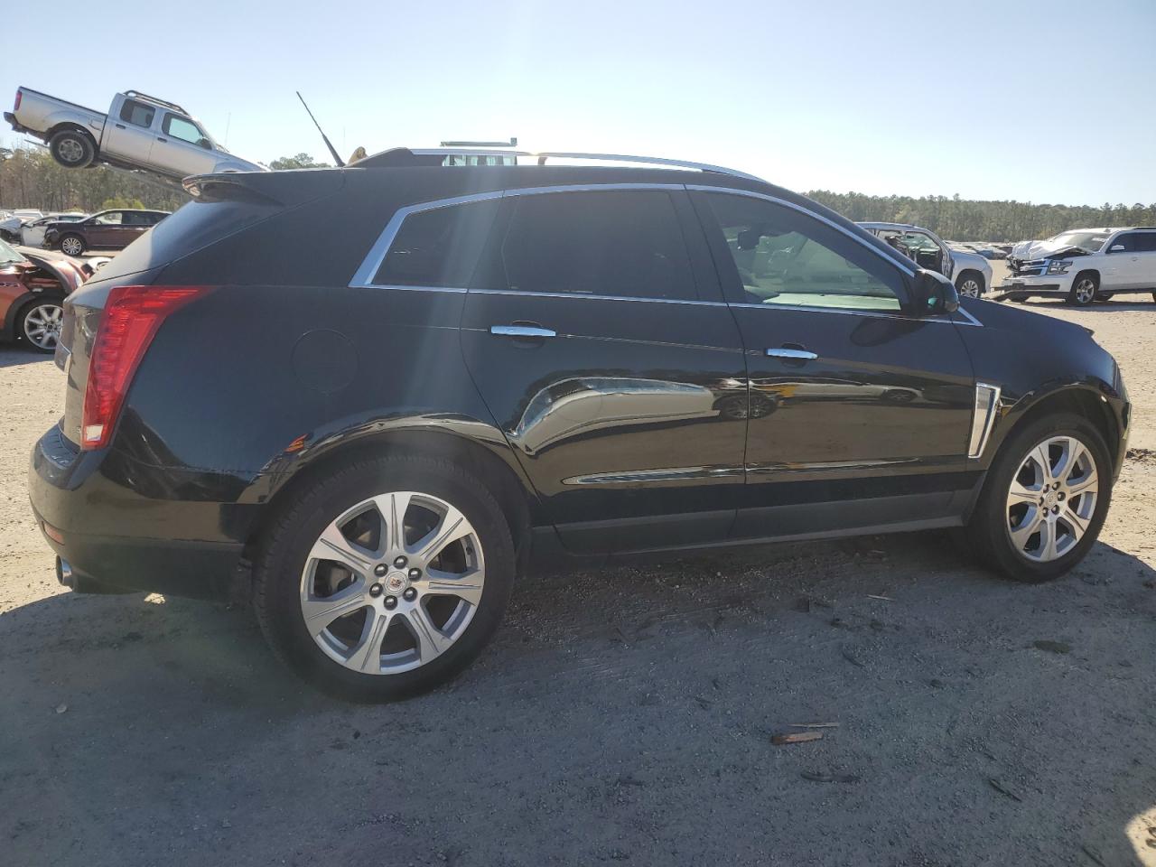 2013 Cadillac SRX VIN 3GYFNDE35DS619935 Copart auction photo, front end damage thumbnail 3