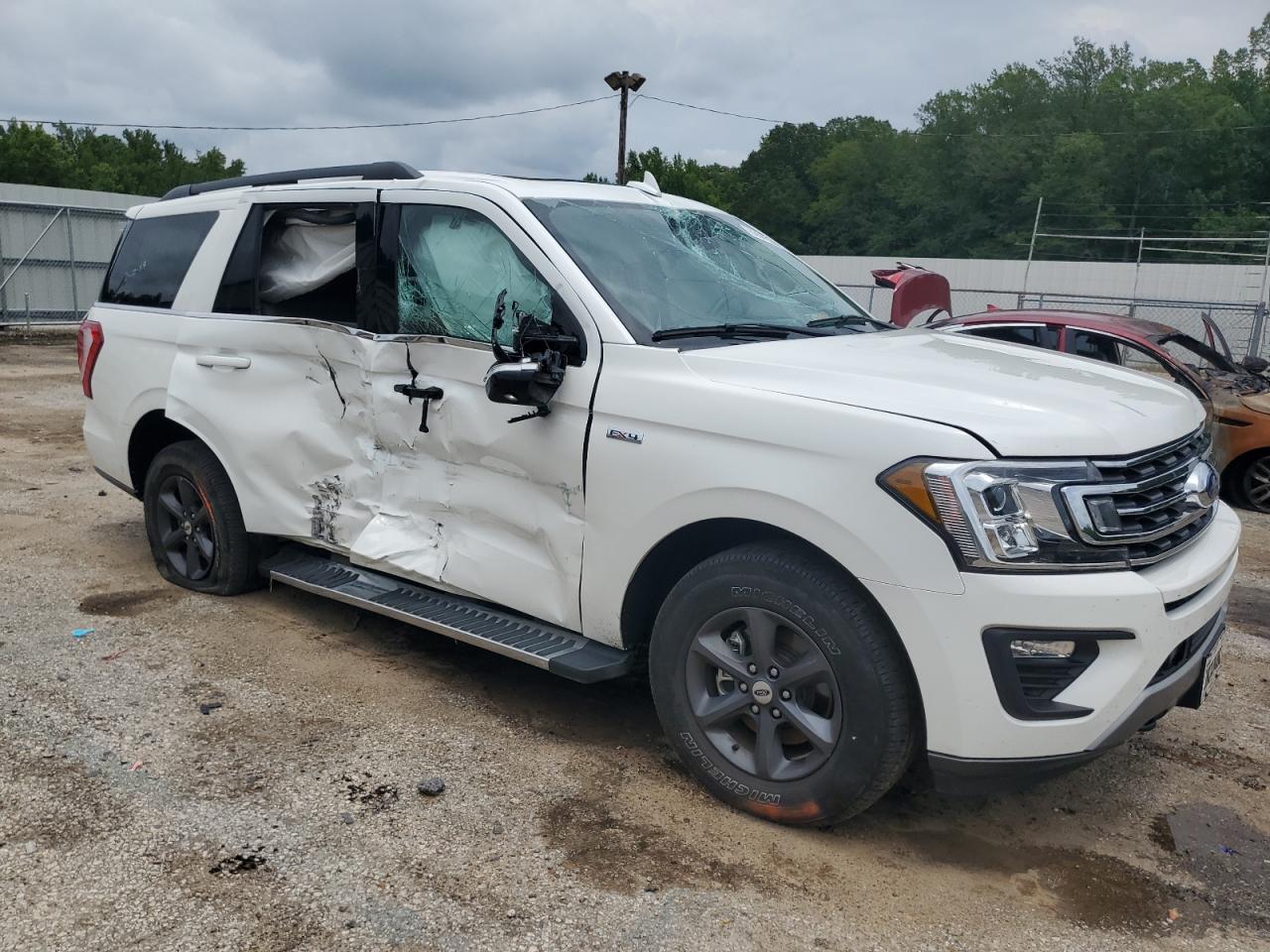 2021 Ford Expedition VIN 1FMJU1JT2MEA82762 Copart auction photo, side damage thumbnail 4