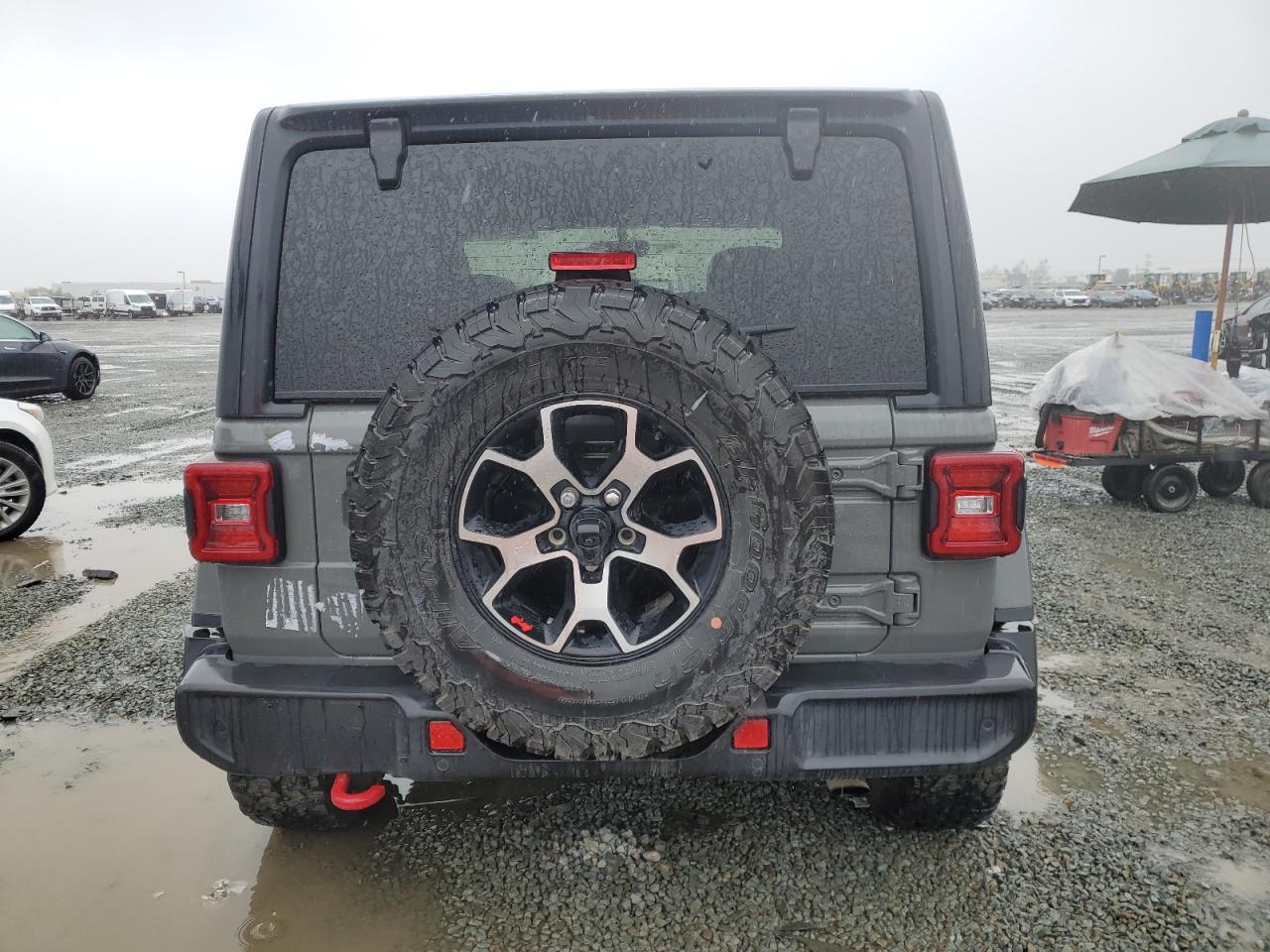 2021 Jeep Wrangler VIN 1C4HJXCN5MW558607 Copart auction photo, minor dent/scratches damage thumbnail 6