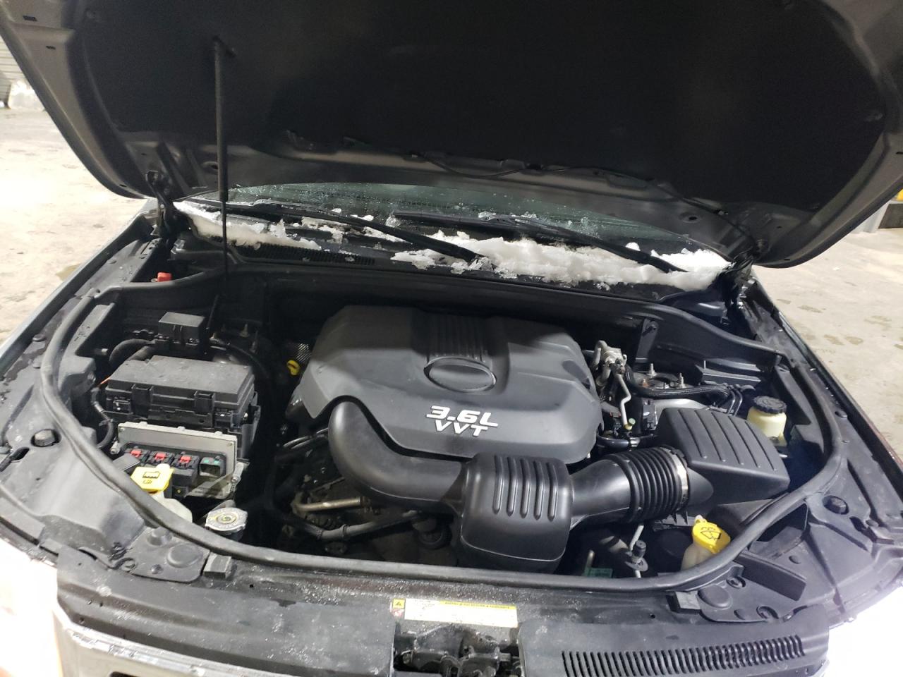 2012 Jeep Grand Cherokee VIN 1C4RJFAG3CC297593 Copart auction photo, rear end damage thumbnail 12