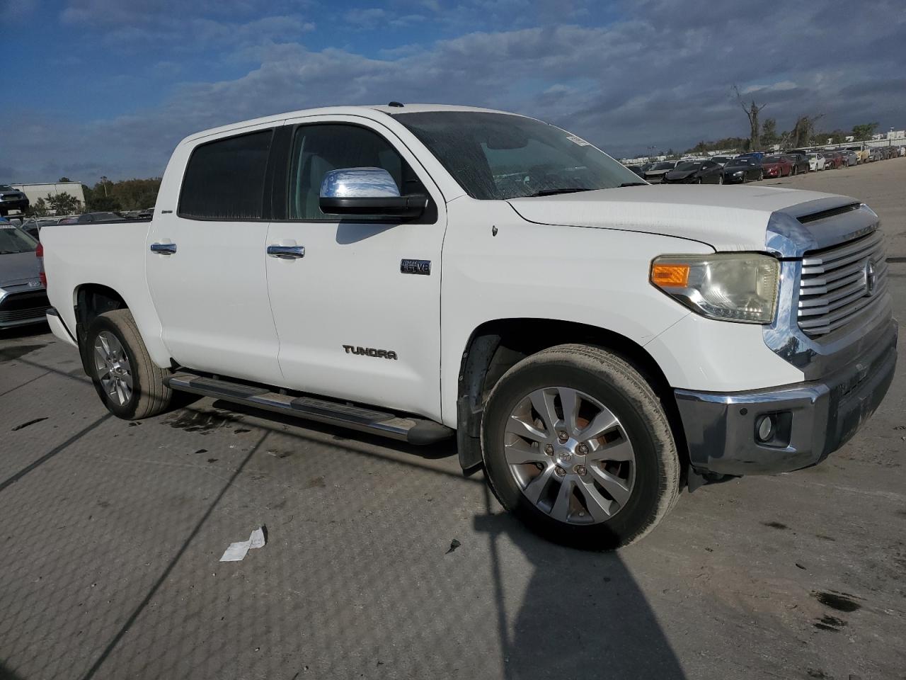2014 Toyota Tundra VIN 5TFFY5F15EX164147 Copart auction photo, minor dent/scratches damage thumbnail 4