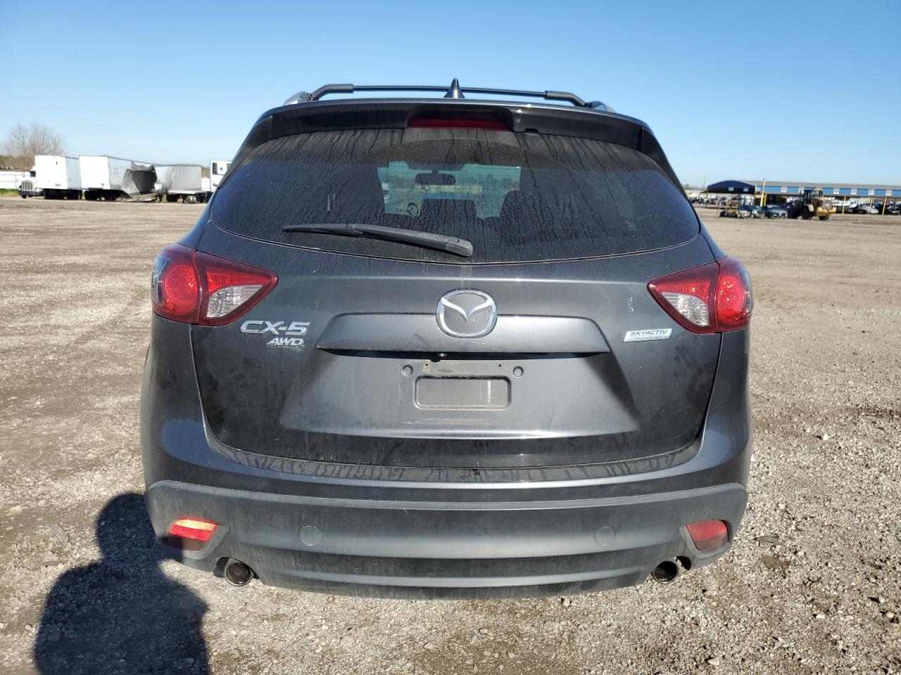2014 Mazda CX-5 VIN JM3KE4CY7E0330249 Copart auction photo, side / minor dent/scratches damage thumbnail 6