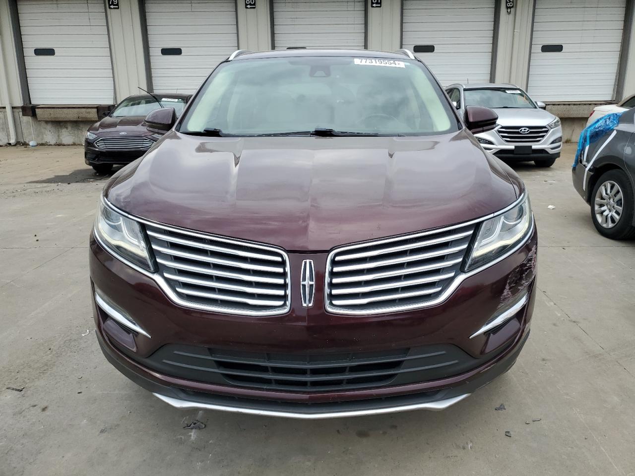 2016 Lincoln MKC VIN 5LMCJ3D9XGUJ21697 Copart auction photo, rear end / minor dent/scratches damage thumbnail 5