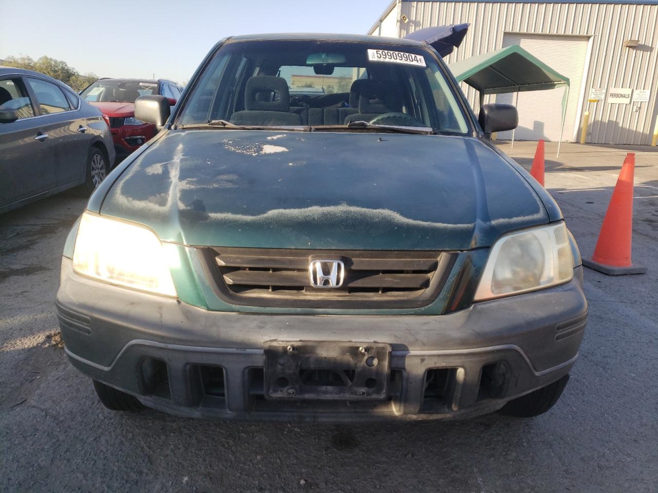 1999 Honda CR-V VIN JHLRD1849XC083285 Copart auction photo, vandalism damage thumbnail 5
