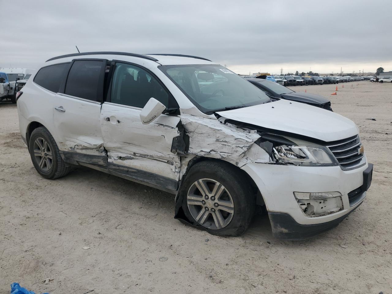 2016 Chevrolet Traverse VIN 1GNKRGKD2GJ132292 Copart auction photo, side / front end damage thumbnail 4