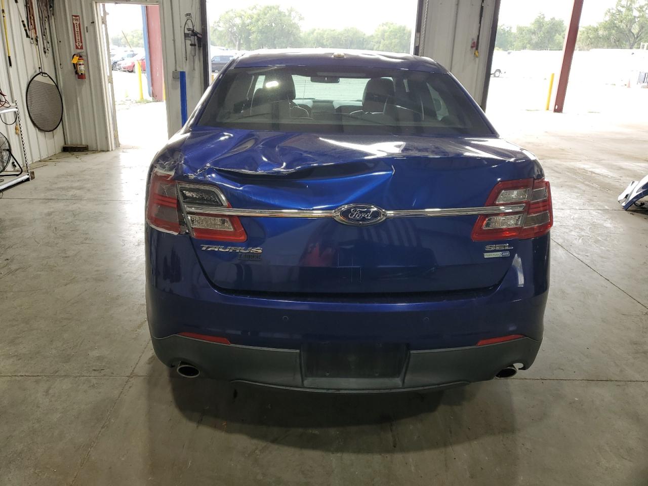 2013 Ford Taurus VIN 1FAHP2H82DG128179 Copart auction photo, rear end / top/roof damage thumbnail 6