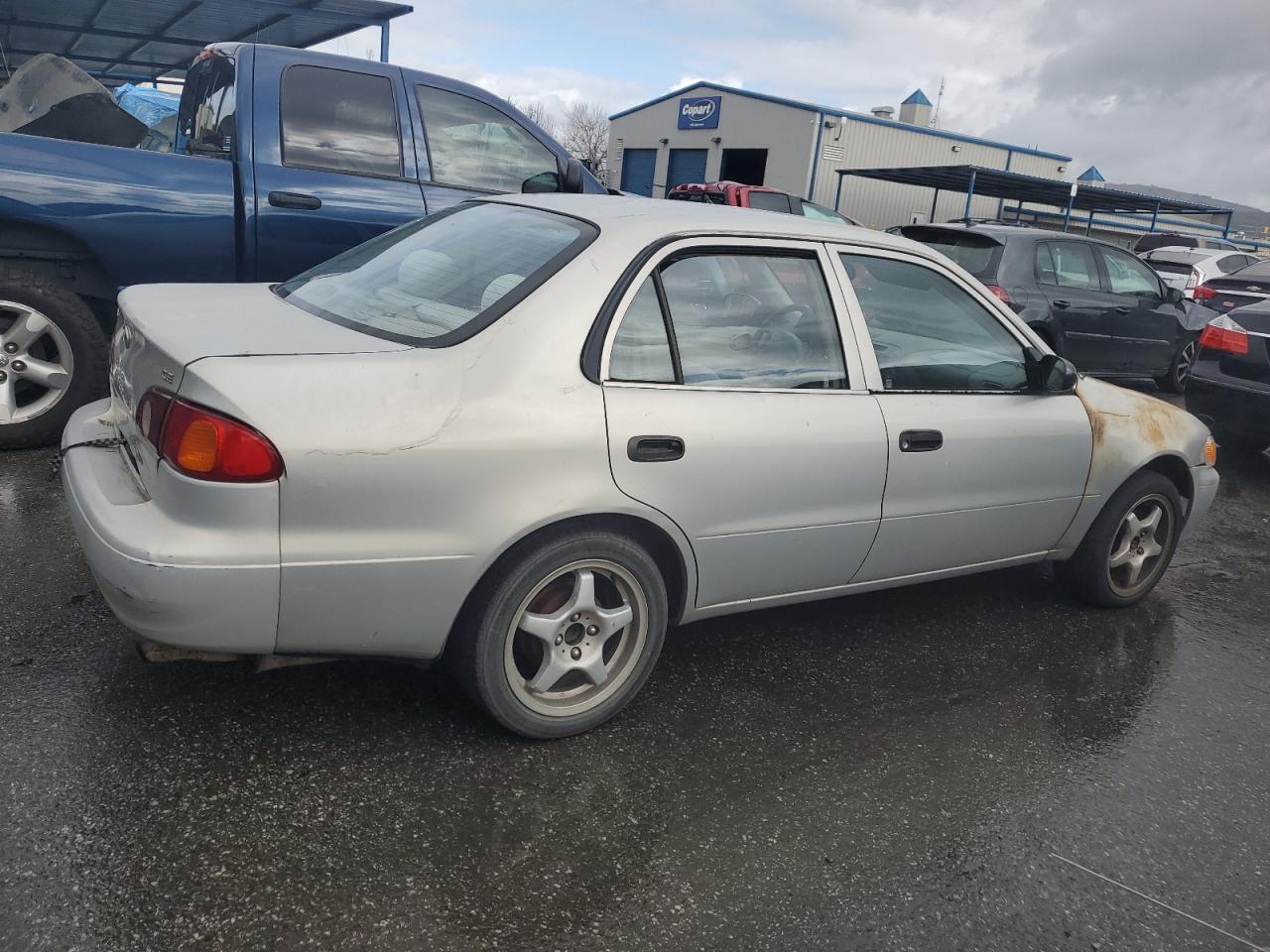 2002 Toyota Corolla VIN 1NXBR12E52Z594539 Copart auction photo, minor dent/scratches damage thumbnail 3