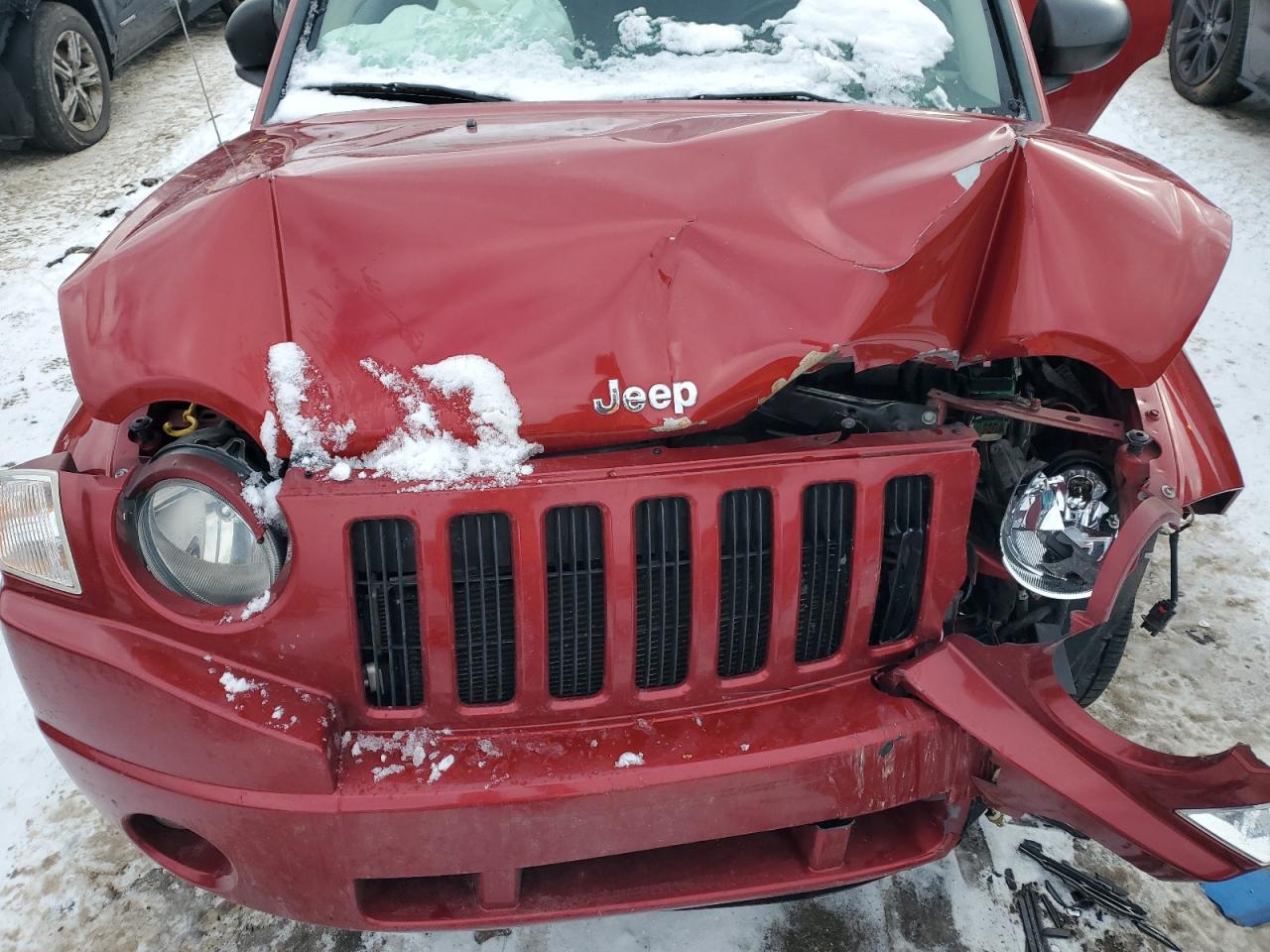 2010 Jeep Compass VIN 1J4NF1FB0AD623710 Copart auction photo, front end damage thumbnail 13