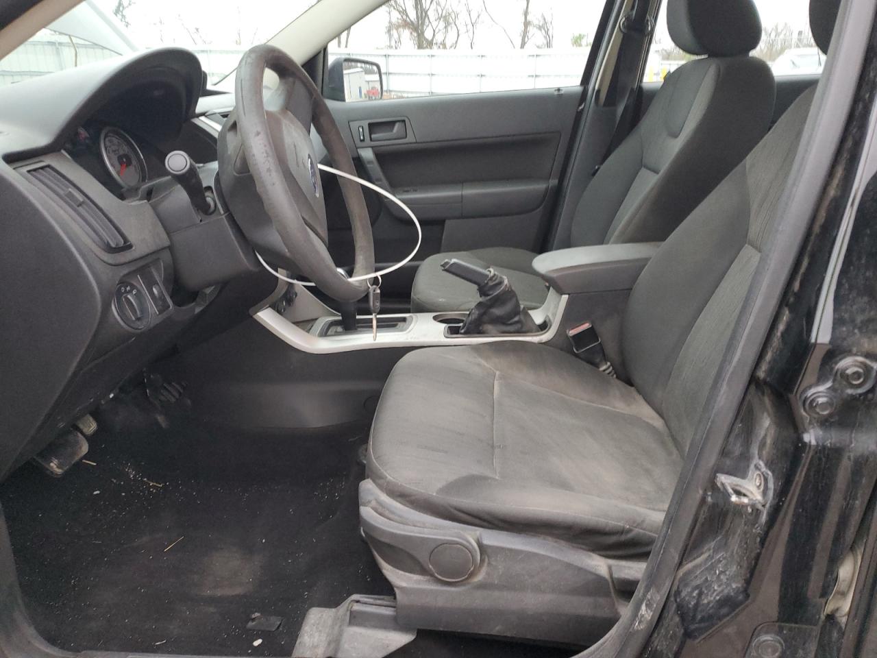 2009 Ford Focus VIN 1FAHP35N89W184821 Copart auction photo, front end damage thumbnail 7