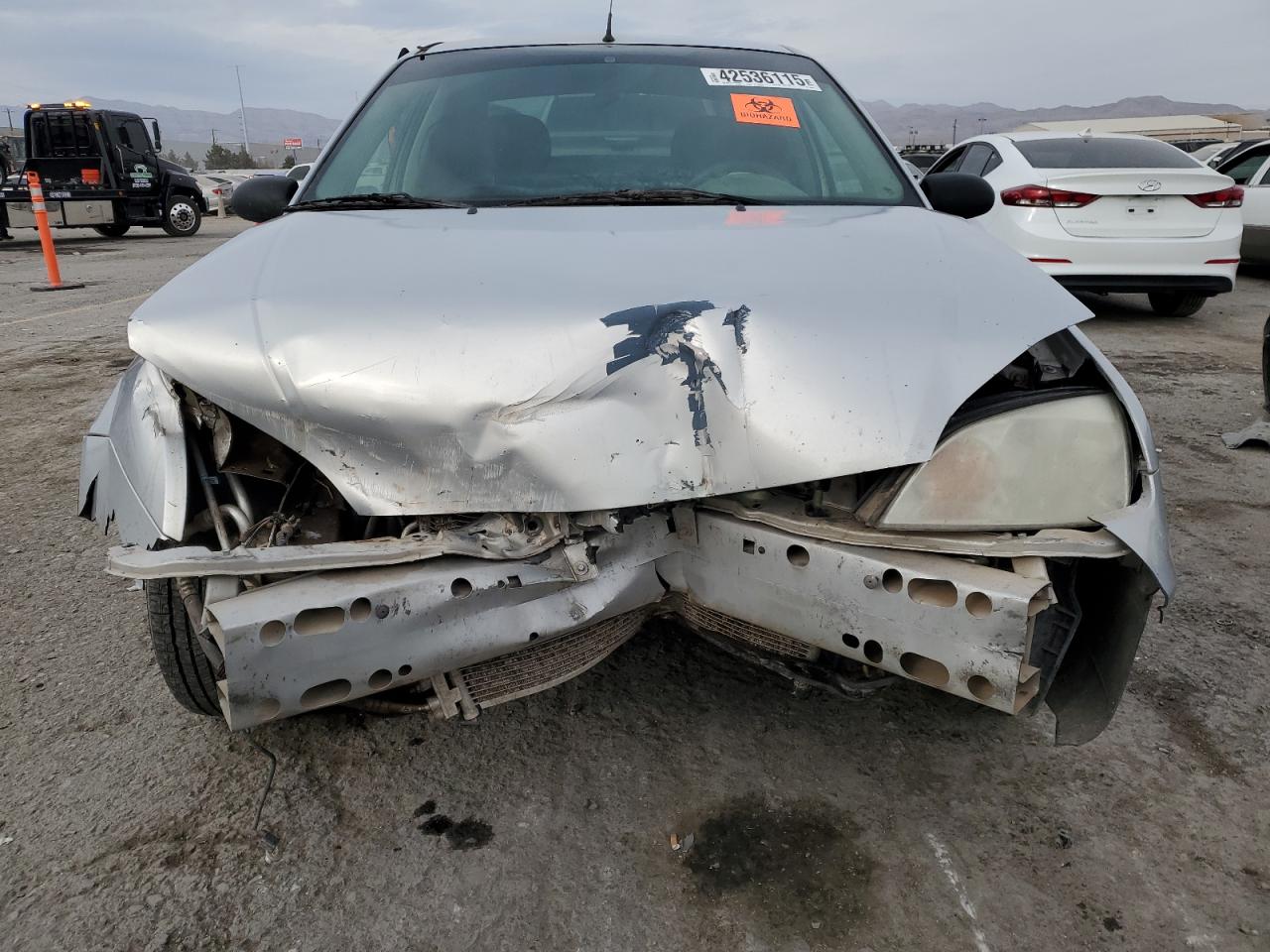 2007 Ford Focus VIN 1FAFP34N77W362045 Copart auction photo, front end damage thumbnail 5