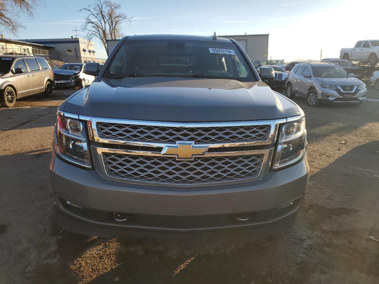 2019 Chevrolet Tahoe VIN 1GNSKBKC7KR157813 Copart auction photo, side damage thumbnail 5