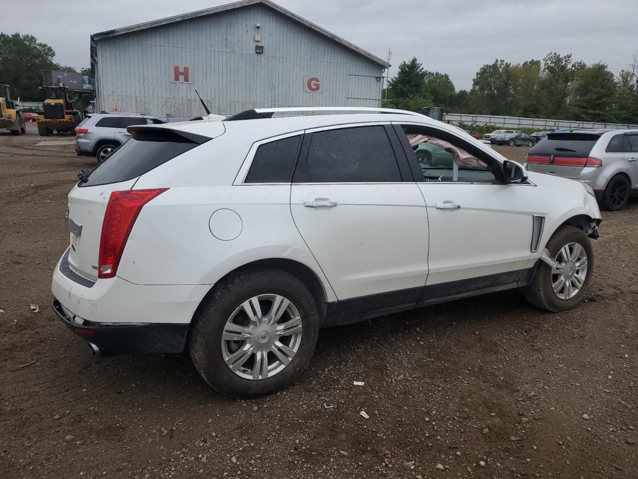 2013 Cadillac SRX VIN 3GYFNCE34DS641225 Copart auction photo, front end / rear end damage thumbnail 3