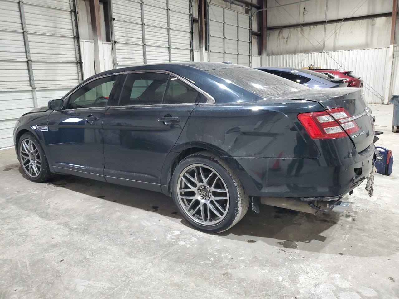 2014 Ford Taurus VIN 1FAHP2E84EG137990 Copart auction photo, rear end / front end damage thumbnail 2