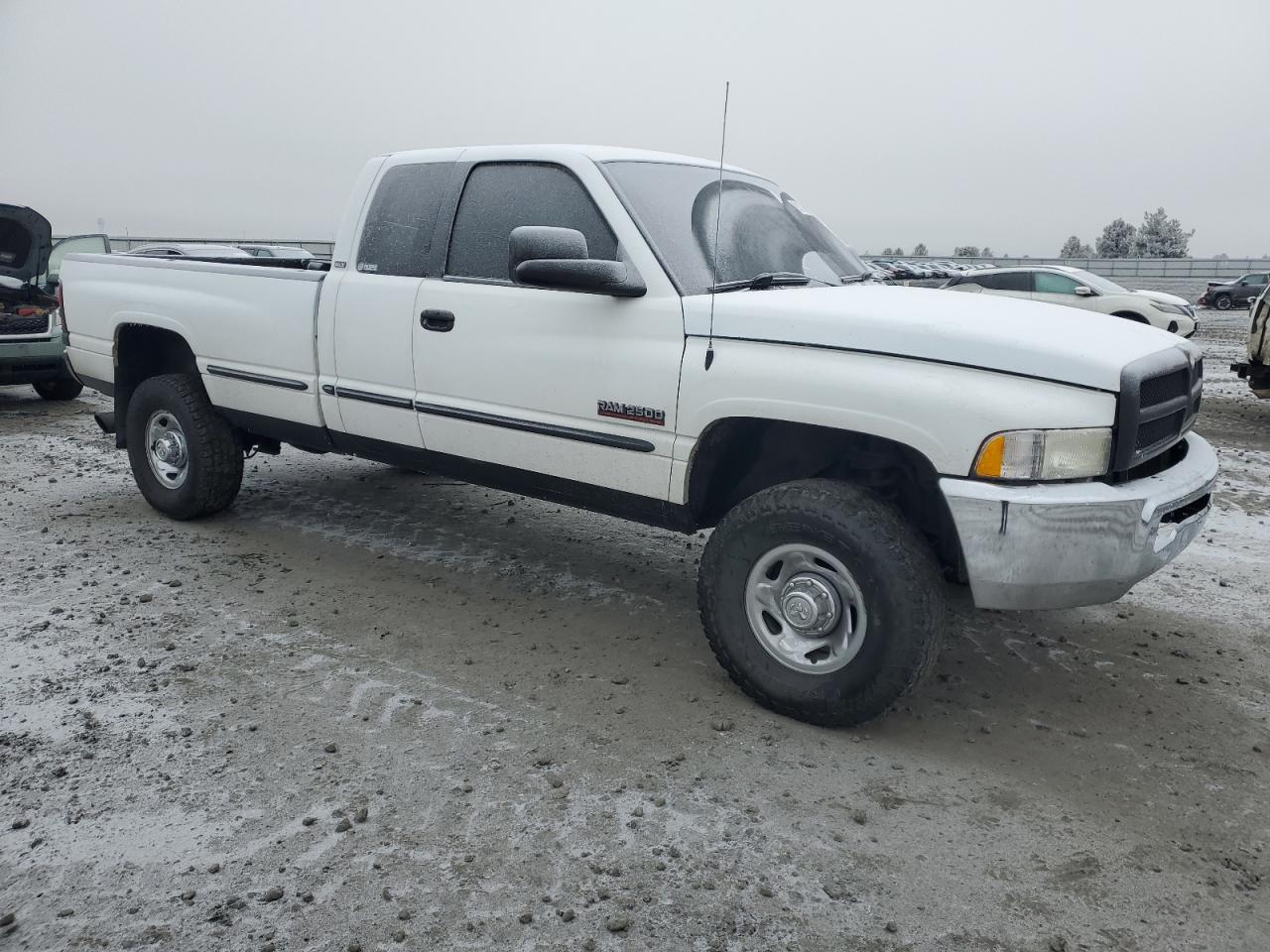1999 Dodge RAM VIN 1B7KF2369XJ588732 Copart auction photo, vandalism damage thumbnail 4