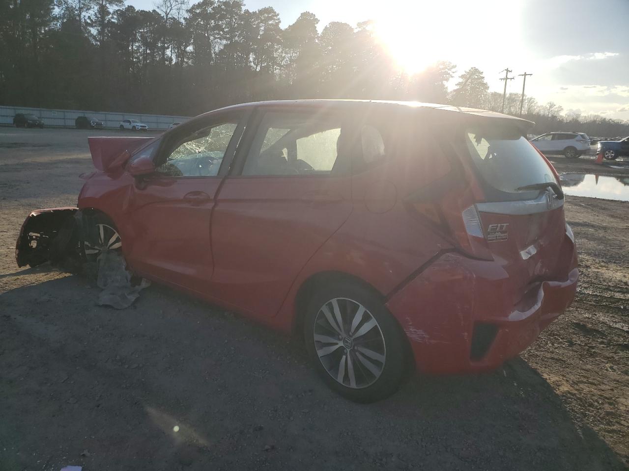 2016 Honda Fit VIN JHMGK5H74GX025040 Copart auction photo, all over damage thumbnail 2