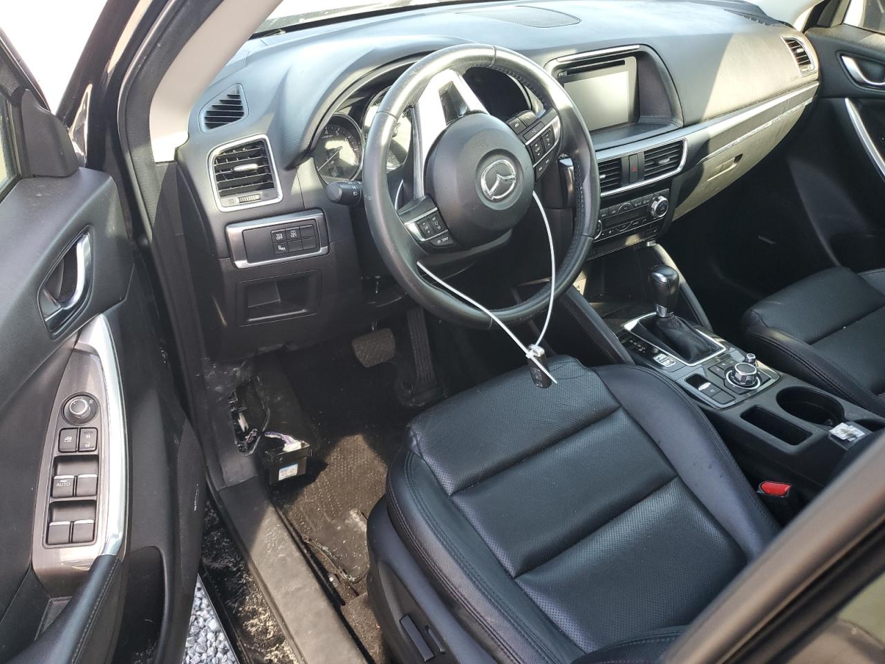 2016 Mazda CX-5 VIN JM3KE2DY5G0696281 Copart auction photo, water/flood damage thumbnail 8