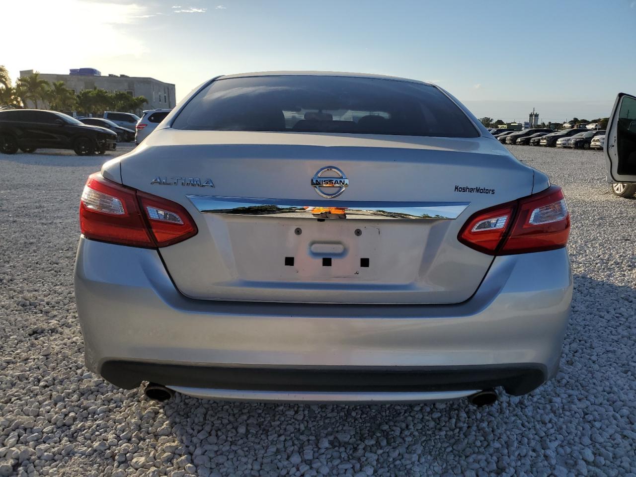 2016 Nissan Altima VIN 1N4AL3AP5GC192913 Copart auction photo, side / minor dent/scratches damage thumbnail 6