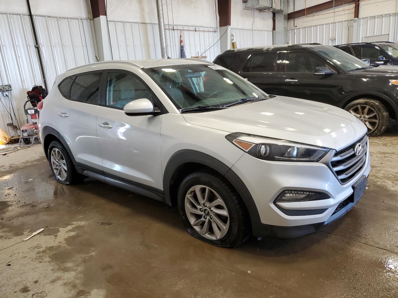 2016 Hyundai Tucson VIN KM8J3CA46GU086623 Copart auction photo, vandalism damage thumbnail 4