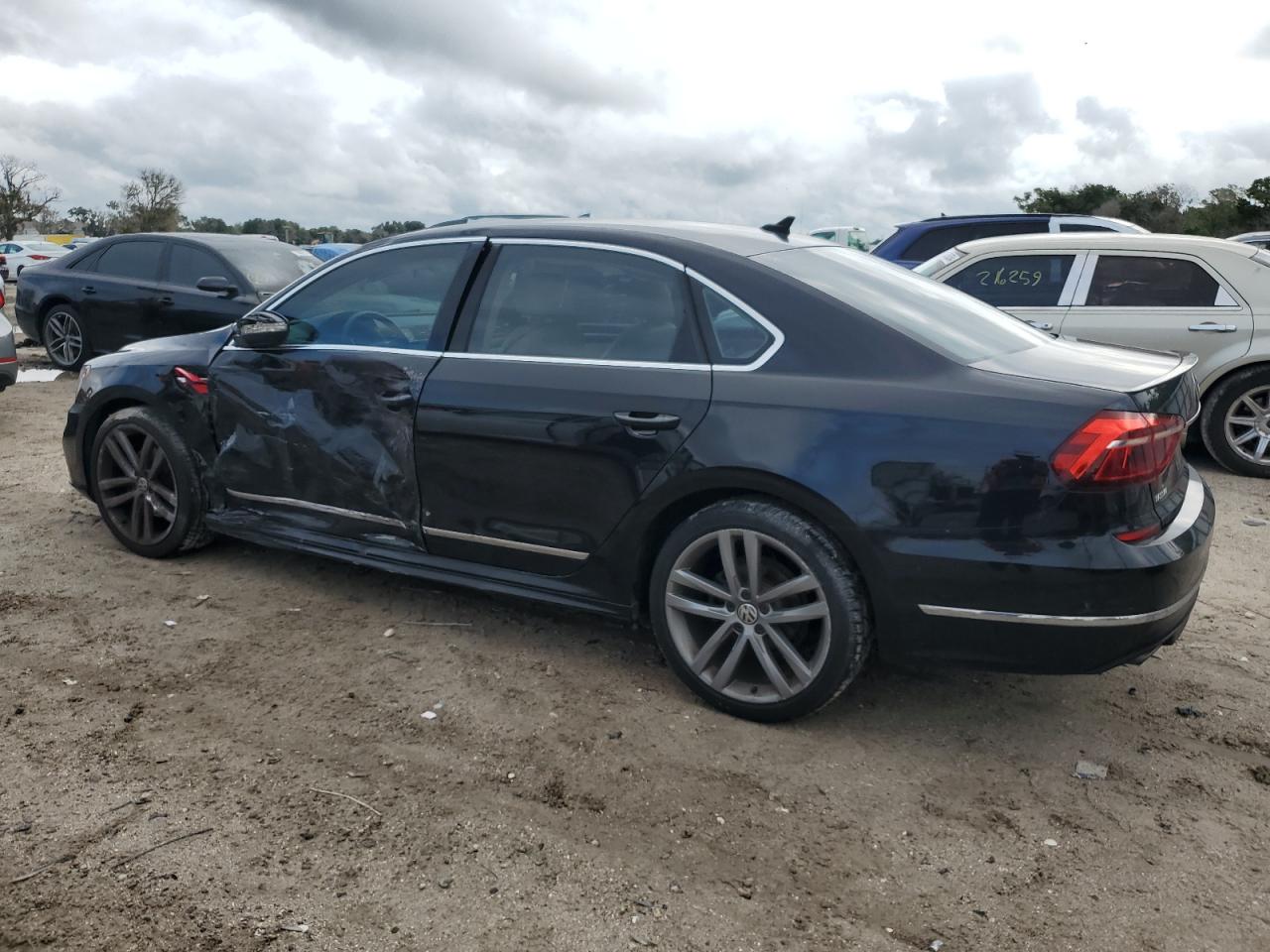 2017 Volkswagen Passat VIN 1VWDT7A32HC051615 Copart auction photo, side / front end damage thumbnail 2