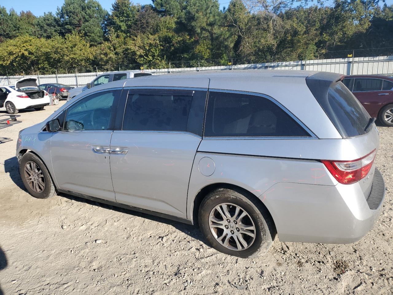 2012 Honda Odyssey VIN 5FNRL5H41CB067800 Copart auction photo, front end / minor dent/scratches damage thumbnail 2