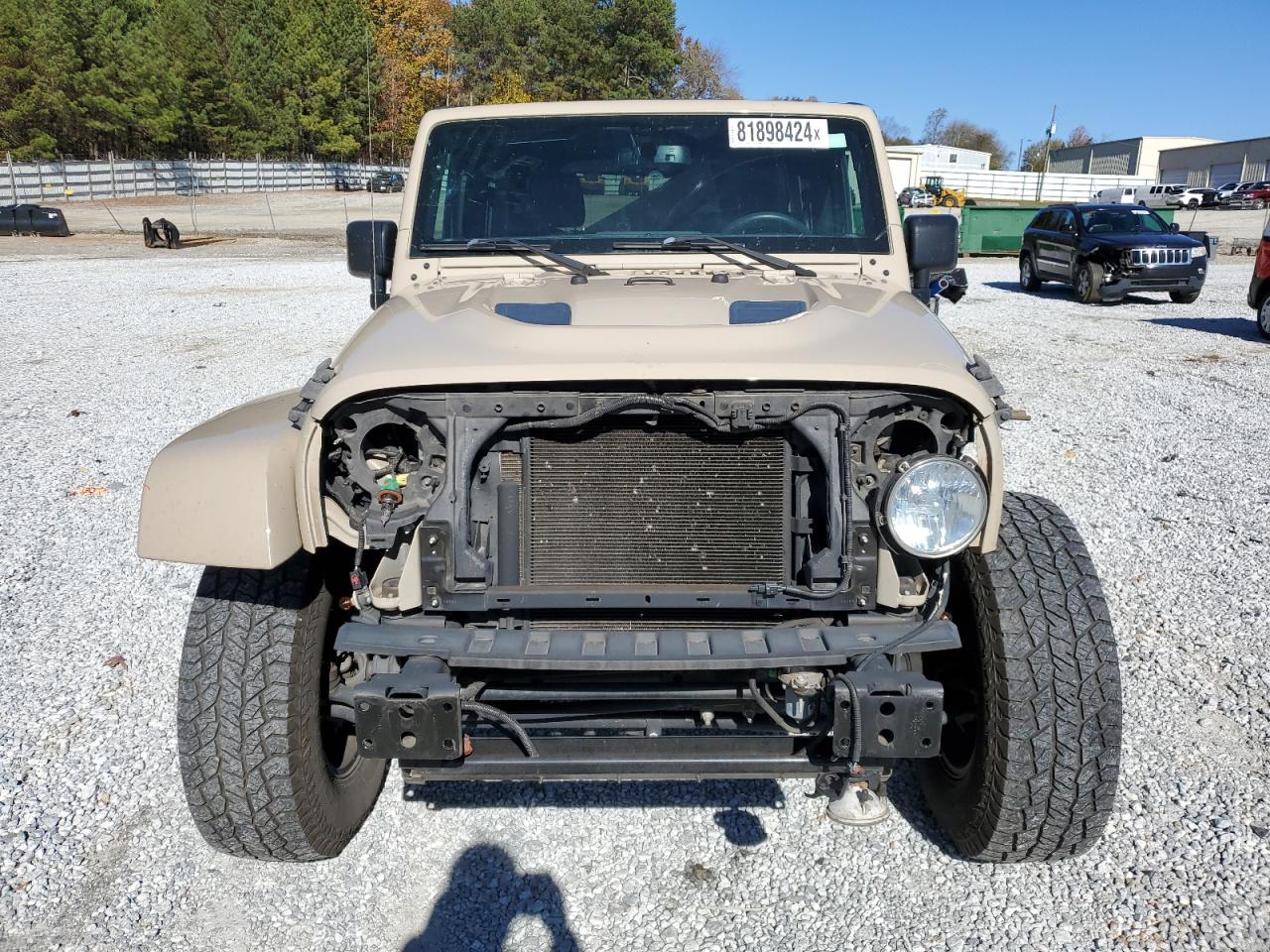 2016 Jeep Wrangler VIN 1C4AJWBG3GL217999 Copart auction photo, front end / minor dent/scratches damage thumbnail 5