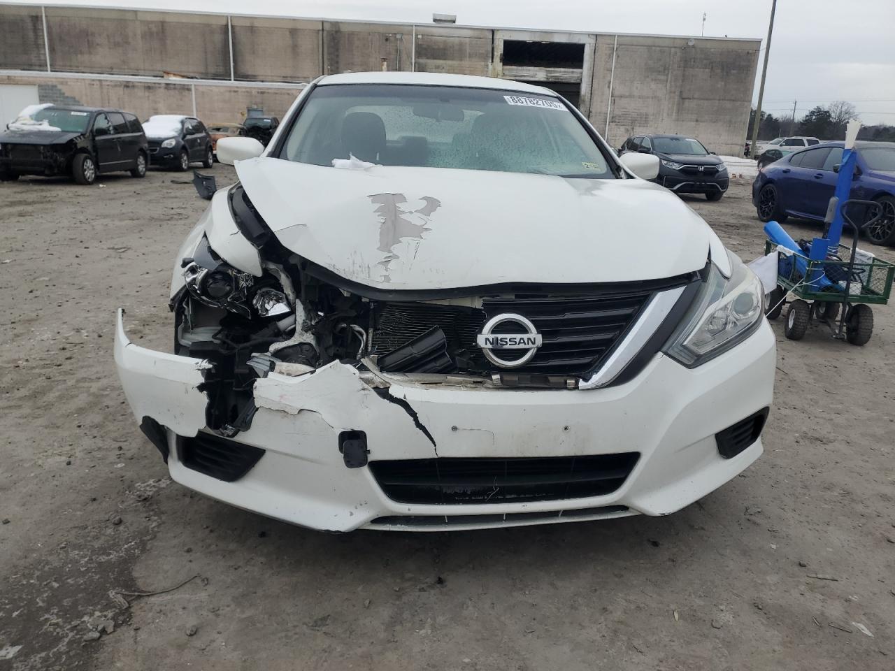 2016 Nissan Altima VIN 1N4AL3AP2GC223454 Copart auction photo, front end / minor dent/scratches damage thumbnail 5