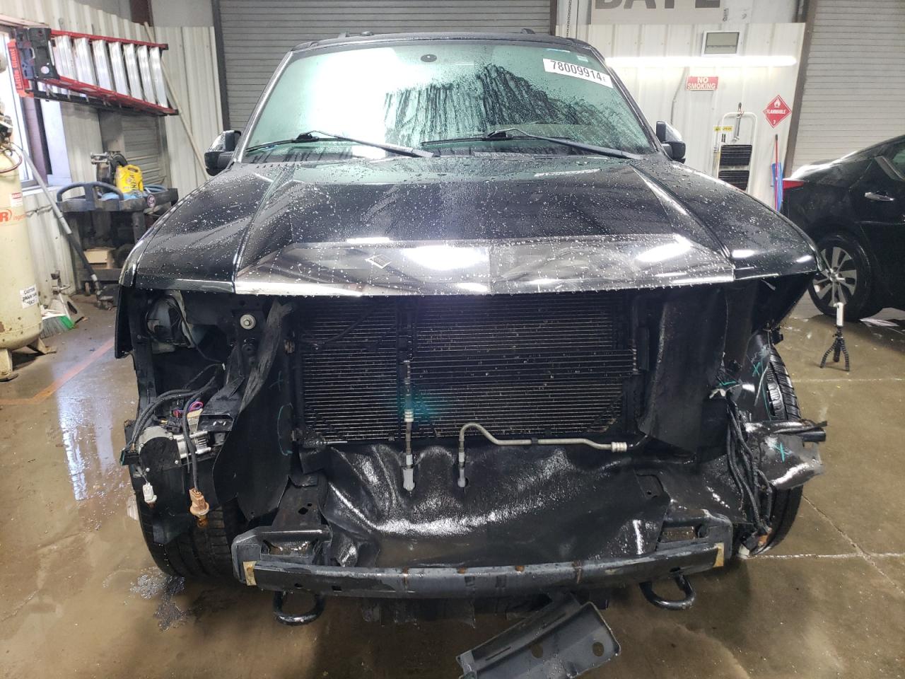 2012 Lincoln Navigator VIN 5LMJJ2J59CEL00398 Copart auction photo, front end damage thumbnail 5
