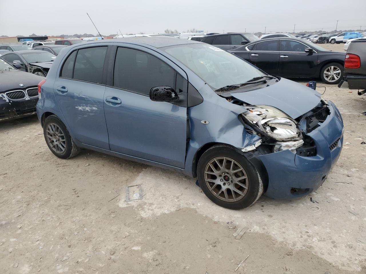 2010 Toyota Yaris VIN JTDKT4K38A5280494 Copart auction photo, front end / side damage thumbnail 4