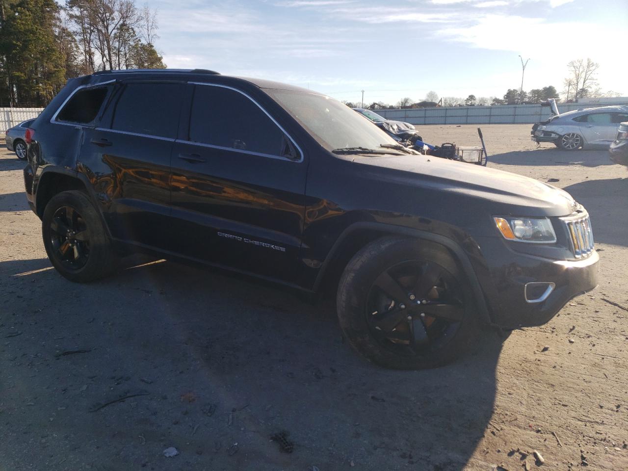 2015 Jeep Grand Cherokee VIN 1C4RJEAG9FC219107 Copart auction photo, side damage thumbnail 4