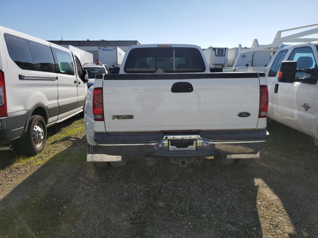 1999 Ford F350 VIN 1FTWW33F1XEB76093 Copart auction photo, vandalism damage thumbnail 6