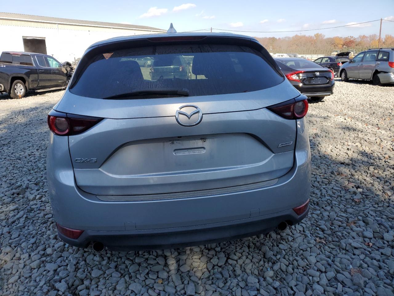 2017 Mazda CX-5 VIN JM3KFBCL7H0202538 Copart auction photo, side / front end damage thumbnail 6