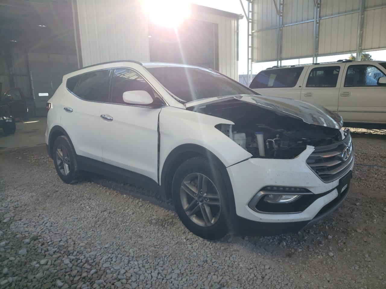 2017 Hyundai Santa Fe VIN 5NMZU3LB6HH034935 Copart auction photo, front end / minor dent/scratches damage thumbnail 4