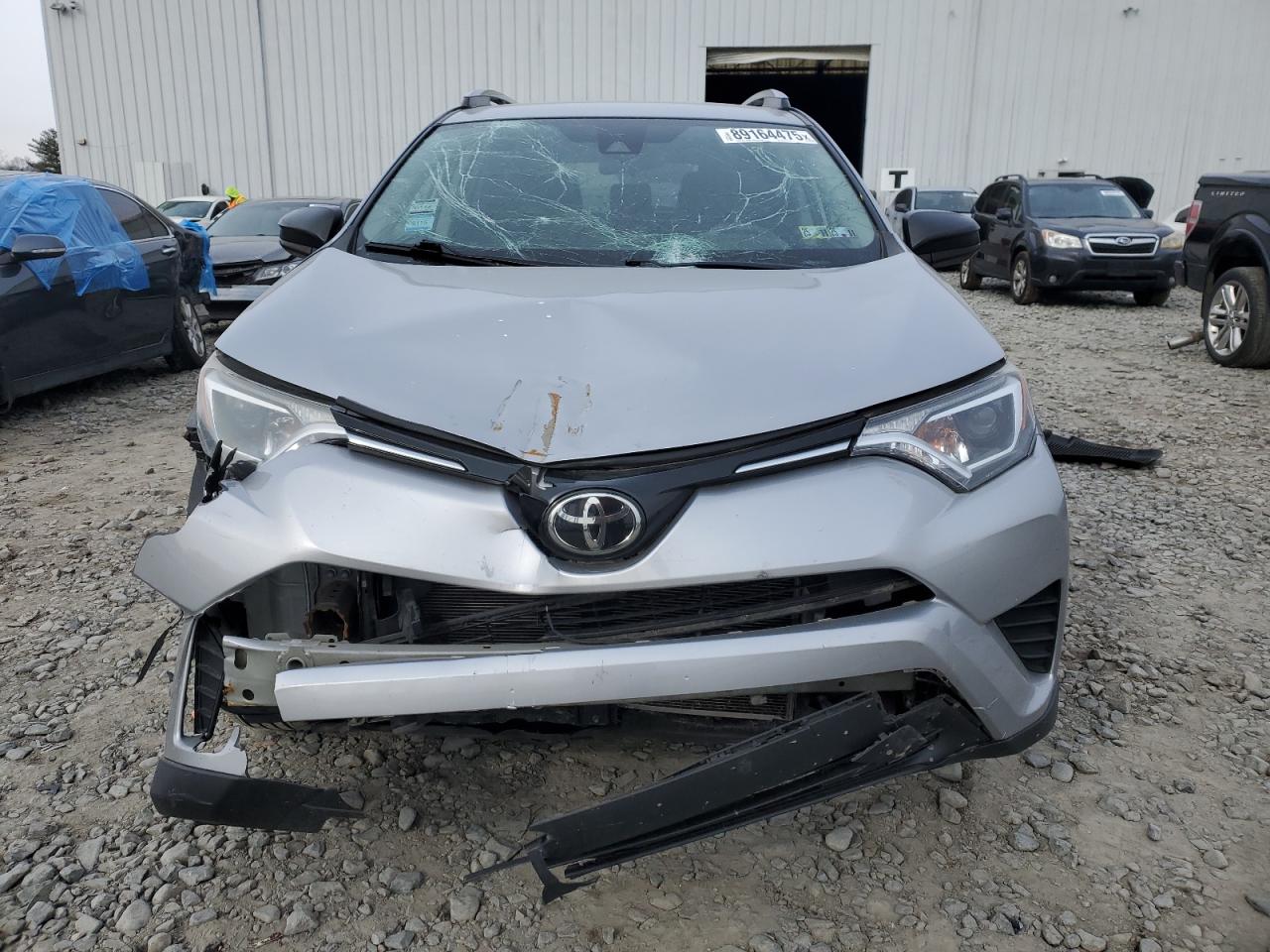 2017 Toyota RAV 4 VIN 2T3BFREV3HW671296 Copart auction photo, front end damage thumbnail 5